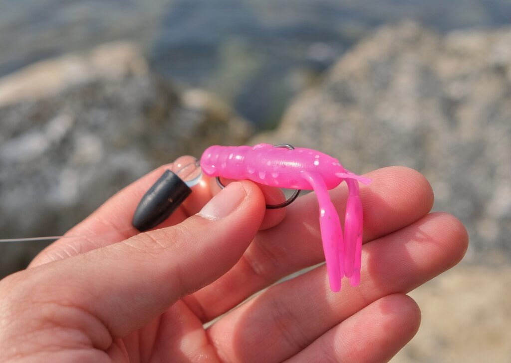 Weedless rigging a soft plastic lure